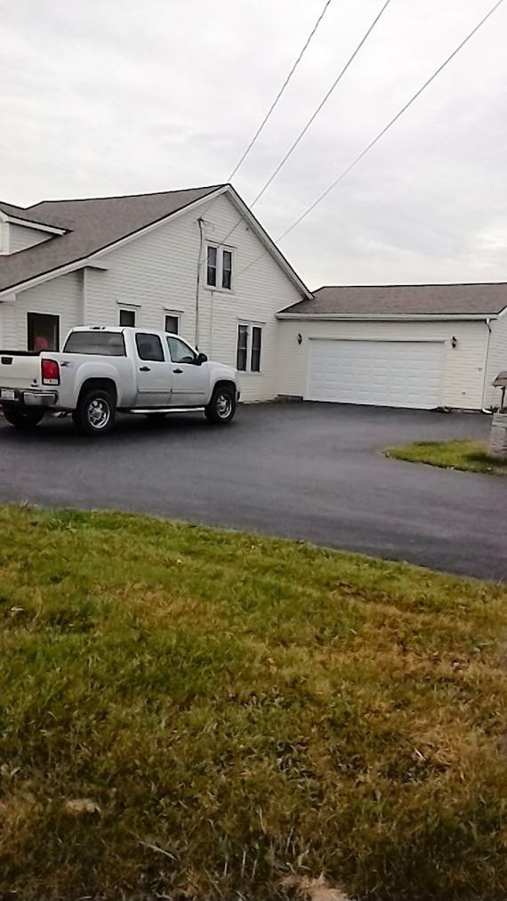 black top and 2 car garage