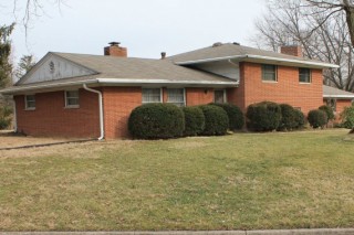 Great brick tri level lots of potential and nice yard.