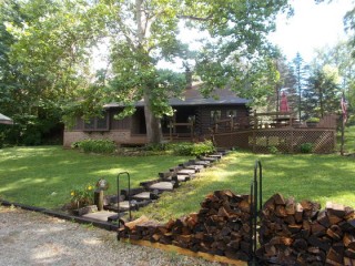 Log Home with park like setting on 1.25 acres