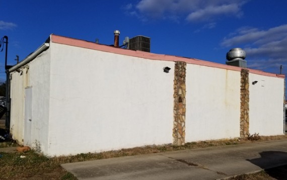 South Side of the Building. Possible New Drive Thru Order Pick Up Window Area??? 