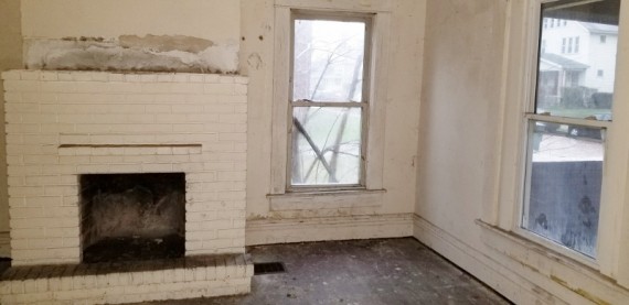First floor unit living room with fireplace