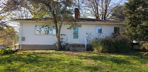 Front View Single Family House. All Original Hardwood Floors