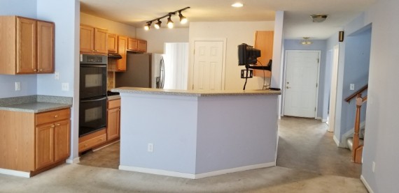 View From Living Room Towards Kitchen, Stairs & Main Entrance