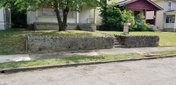 Rock Retaining Wall, Curb, Gutter, Sidewalk 