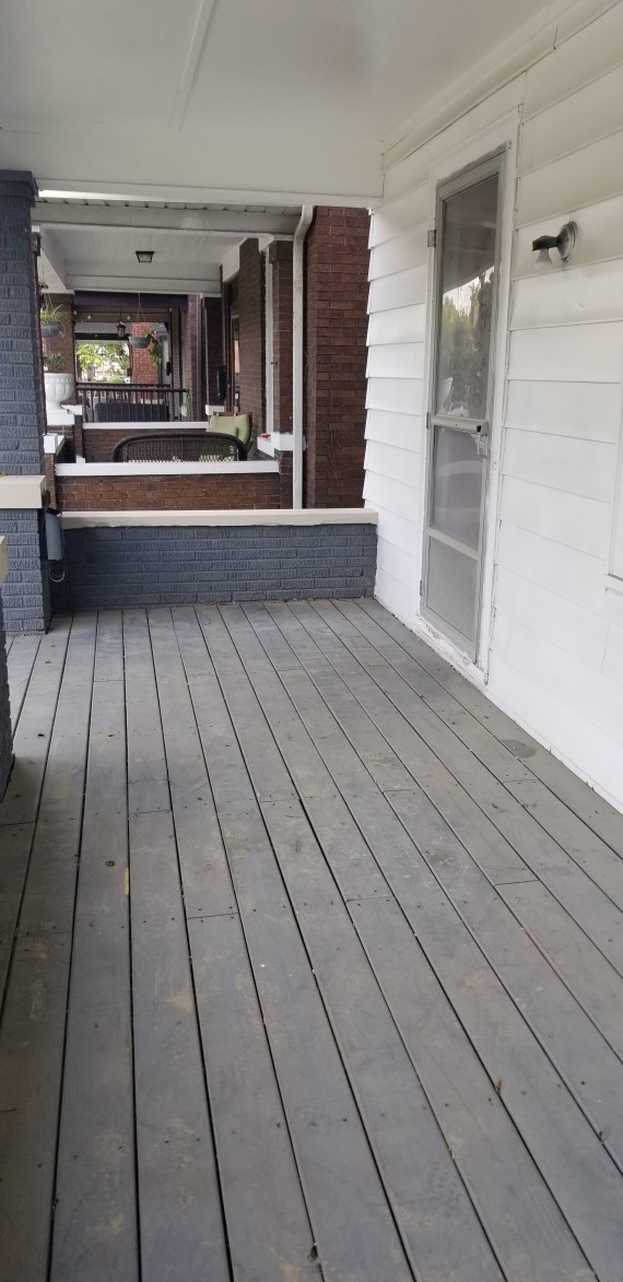 Huge covered porch front entrance for socializing.