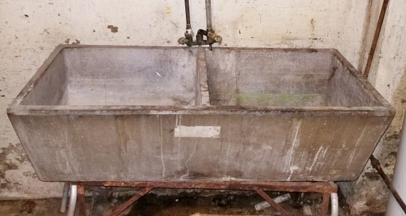 Vintage Concrete Basement Double Sink