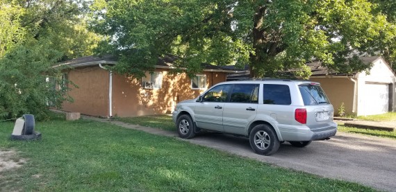 Nice mature trees, shaded back yard and private parking spaces.