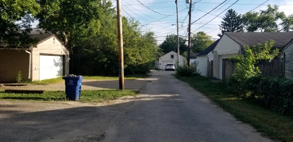 Alley access to private off street parking spaces.