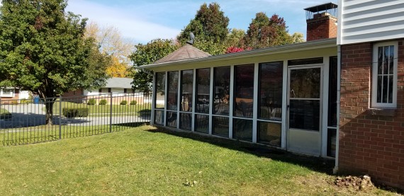 Side Entrance To The Large Covered Glass Enclosed Patio 