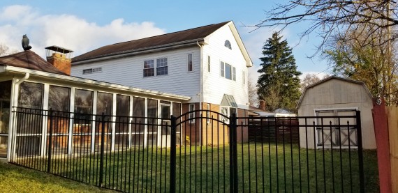 Fenced & Gated Side Yard & Large Storage Shed