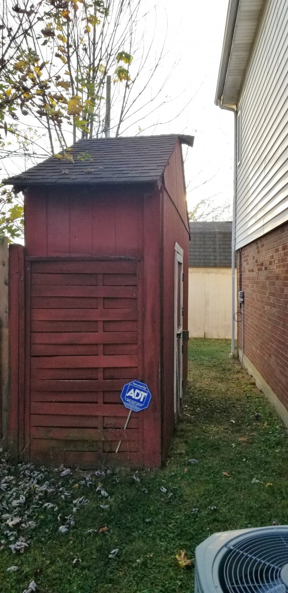 Small Storage Shed Hidden Behind The House