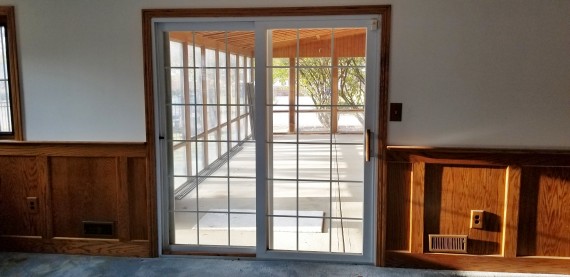 Master Bed Room Sliding Glass Door Access to Enclosed Covered Patio