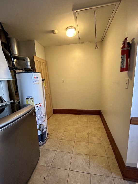 1307 Duplex Side Laundry Room. Storage Area Above In Attic