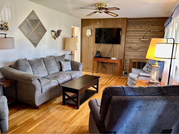 First Floor Living Room, Cozy Fireplace, Original Hardwood Floors