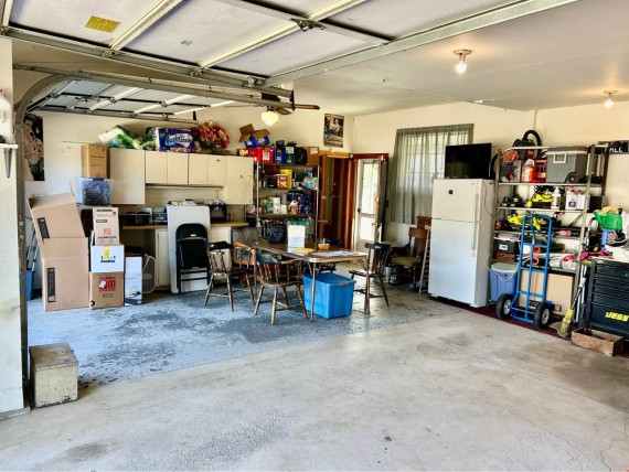 3 Car Attached Finished Garage   Cabinets   Overhead Dry Storage Space