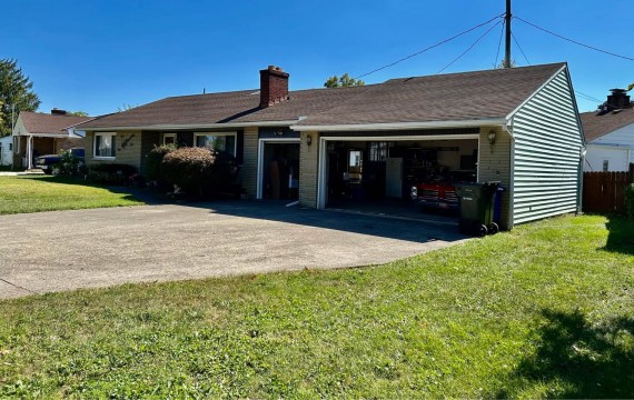 6 Car Concrete Driveway. 3 Car Attached Finished Garage