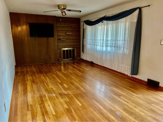 Huge First Floor Living Room, Fireplace, Original Hardwood Floors