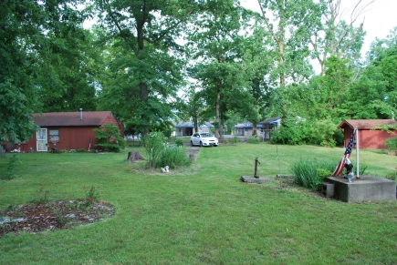 View of the house and the motel from the back of the property