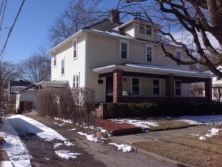 Public Real Estate Auction for Single family home with 4 bedrooms and an adjacent vacant buildable lot.