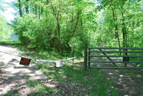 Main gate on N. end of property